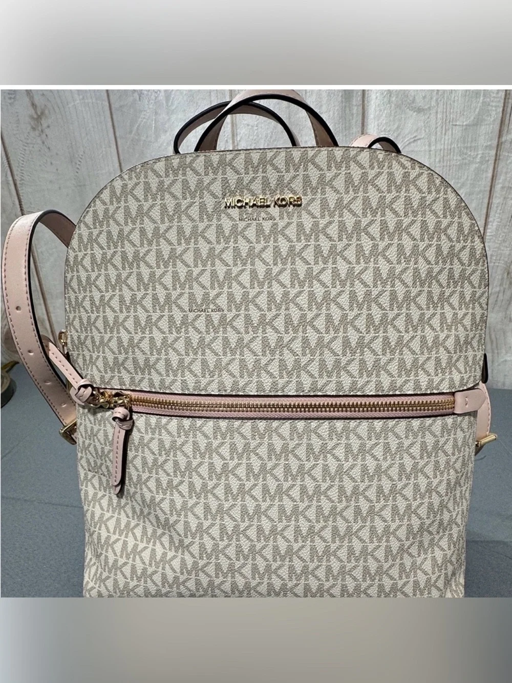 Michael Kors backpack logo